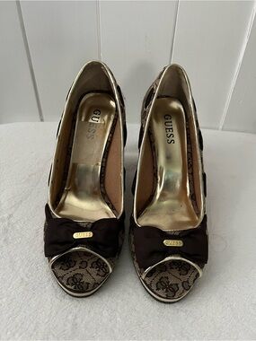 GUESS Brown Lace Logo Peep-Toe Heels with Bow and Gold Accents